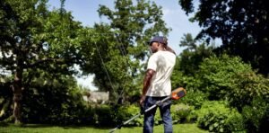 Husqvarna Akku-Trimmer 215iL - Set mit Akku B140/Bli20 und Ladegerät C80 – Bild 3